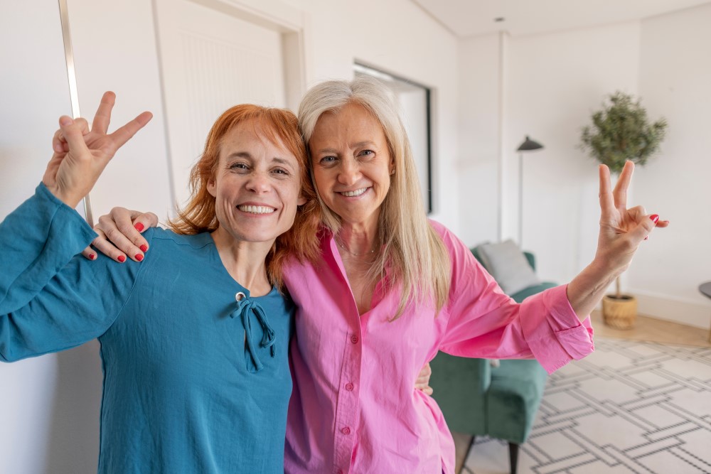 Happy mature lesbian women in their new house, lgbt, free love, new home 